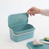Food Waste Caddy Ã MintDimensions
 Height: 10.7 cm
 Length: 12.7 cm
 Width: 22.1 cm
 Capacity volume (ltr): 1.8 litres