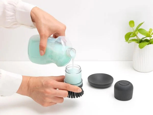 SOAP DISPENSING DISH BRUSH - Dark GreyDimensions:
 Height: 9.8 cm
 Length: 6.4 cm
 Width: 5.7 cm
 Capacity volume (ltr): 0.1 litres