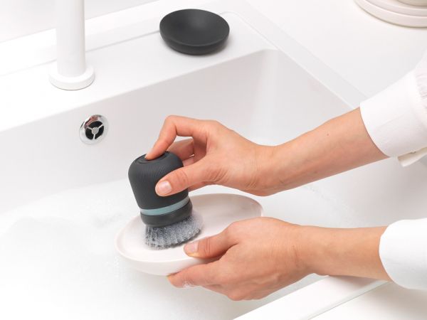 SOAP DISPENSING DISH BRUSH - Dark GreyDimensions:
 Height: 9.8 cm
 Length: 6.4 cm
 Width: 5.7 cm
 Capacity volume (ltr): 0.1 litres