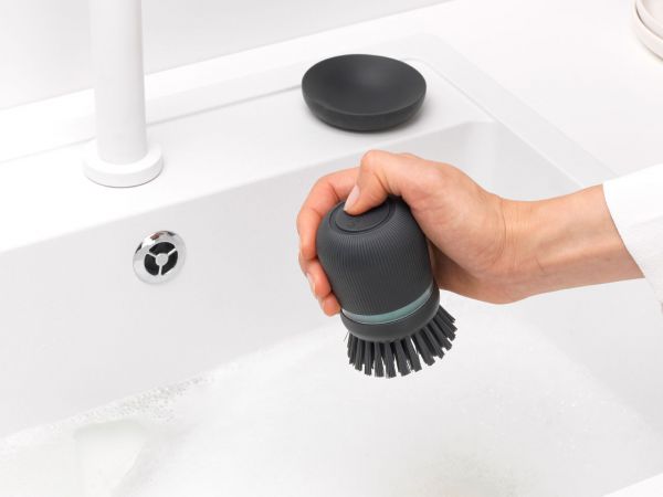 SOAP DISPENSING DISH BRUSH - Dark GreyDimensions:
 Height: 9.8 cm
 Length: 6.4 cm
 Width: 5.7 cm
 Capacity volume (ltr): 0.1 litres