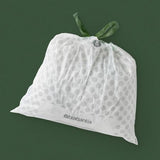 Trash Bag - 36 Liter White trash liners made from plastic.