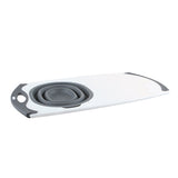 Strainer and cutting board