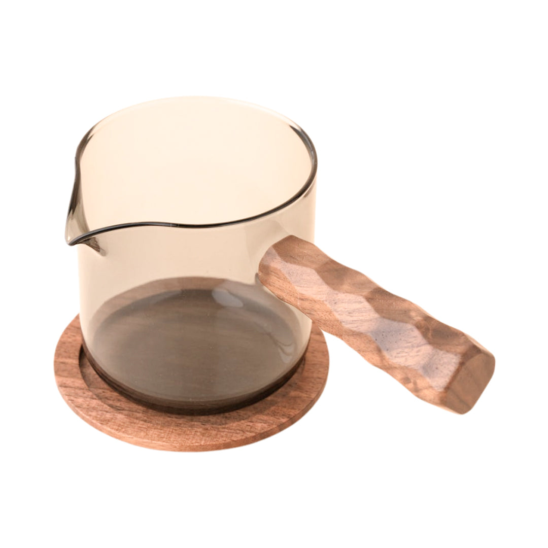 Glass pot with handle and saucer
