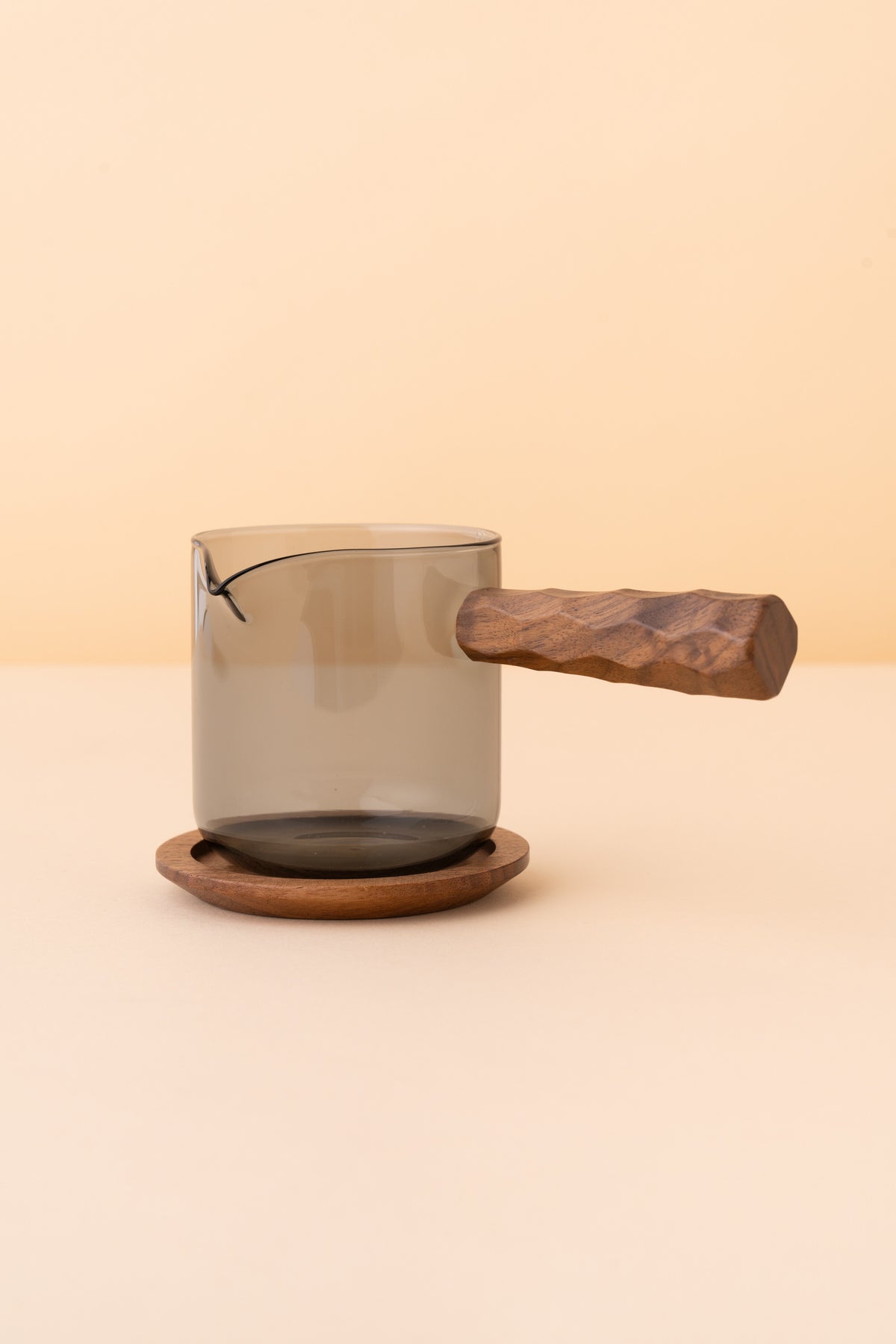 Glass pot with handle and saucer