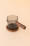 Glass pot with handle and saucer