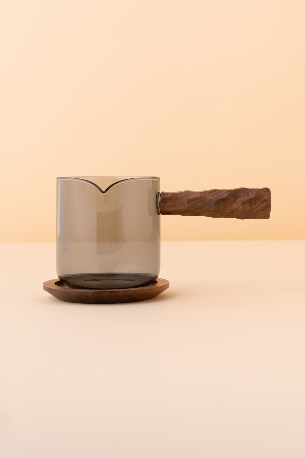 Glass pot with handle and saucer